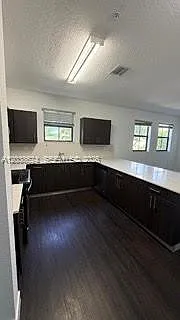 15500 SW 136th St #6-211 — Photo 1