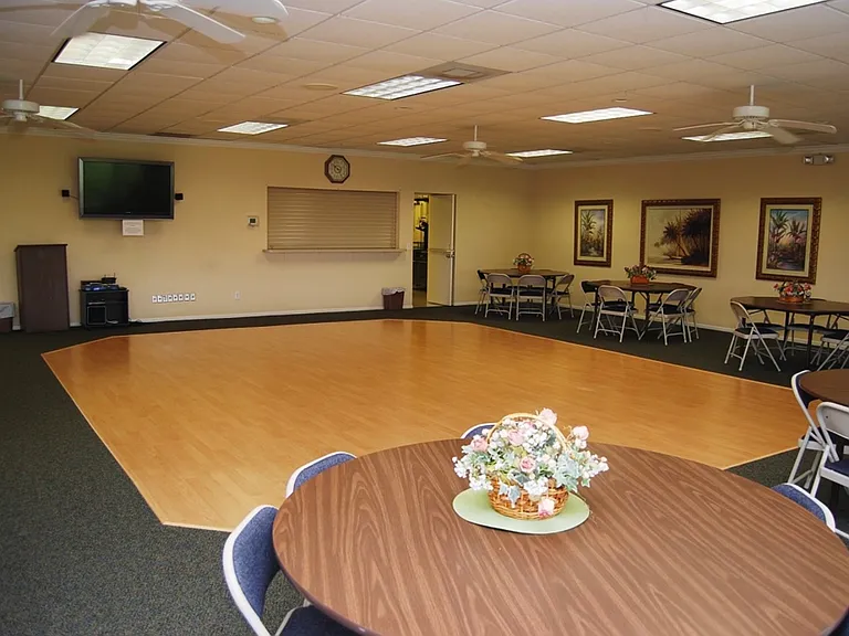 The completely stocked kitchen is behind the passthrough window and door.