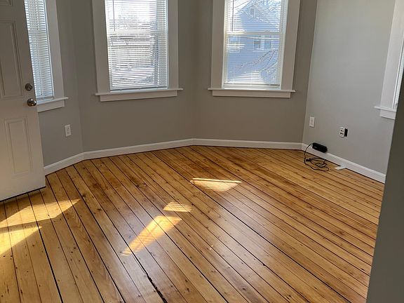 living room with lots of windows and natural light
