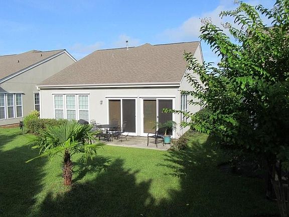 Back Yard with Enclosed Sun Room