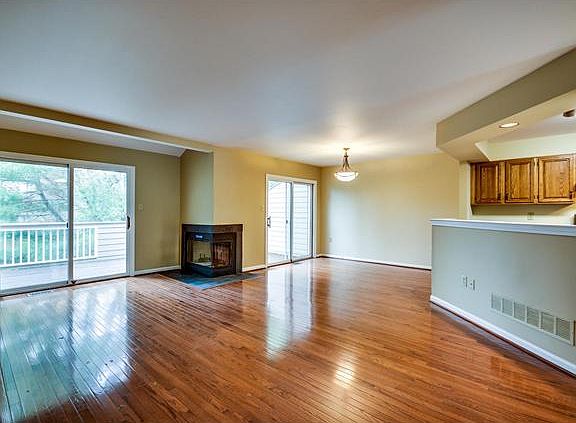 Hardwood flrs flow into open living & dining areas