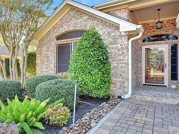 Enter into this all brick patio home through high security glass patio door, brick patio, large sized gutters all around this home..
