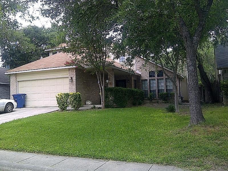 mature trees, 2 car garage