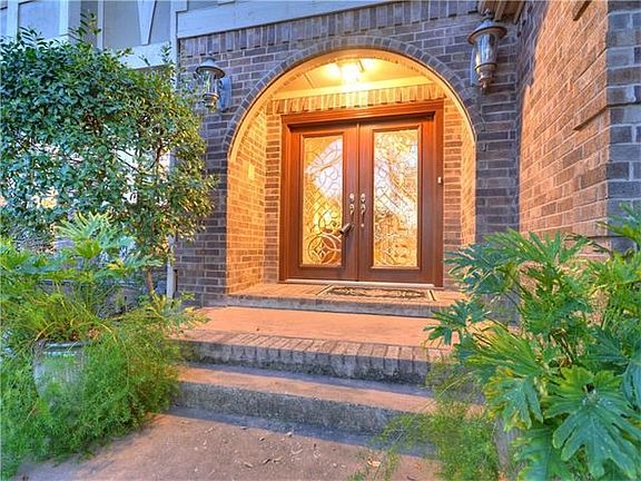 Double doors invite you inside.