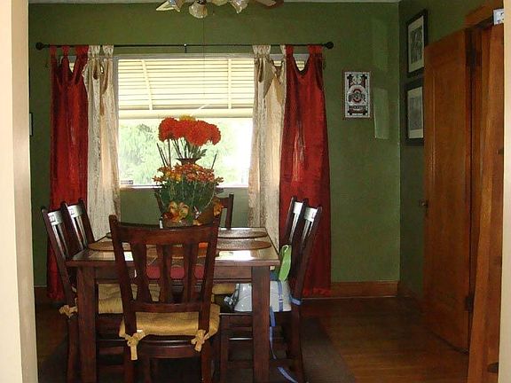 Formal Dining Room with wood floors