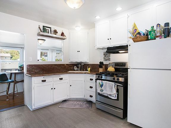 Kitchen next to dining nook.