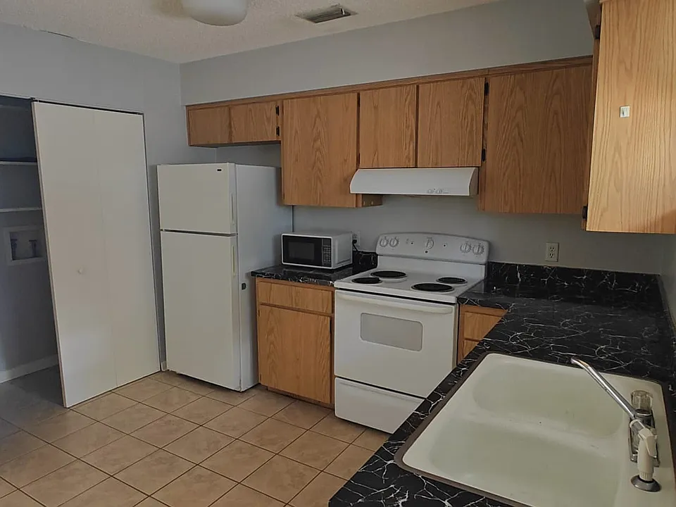 Kitchen complete with washer and dryer hook-ups