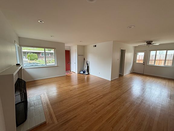 Dining room is to the right w/large window and door to patio.