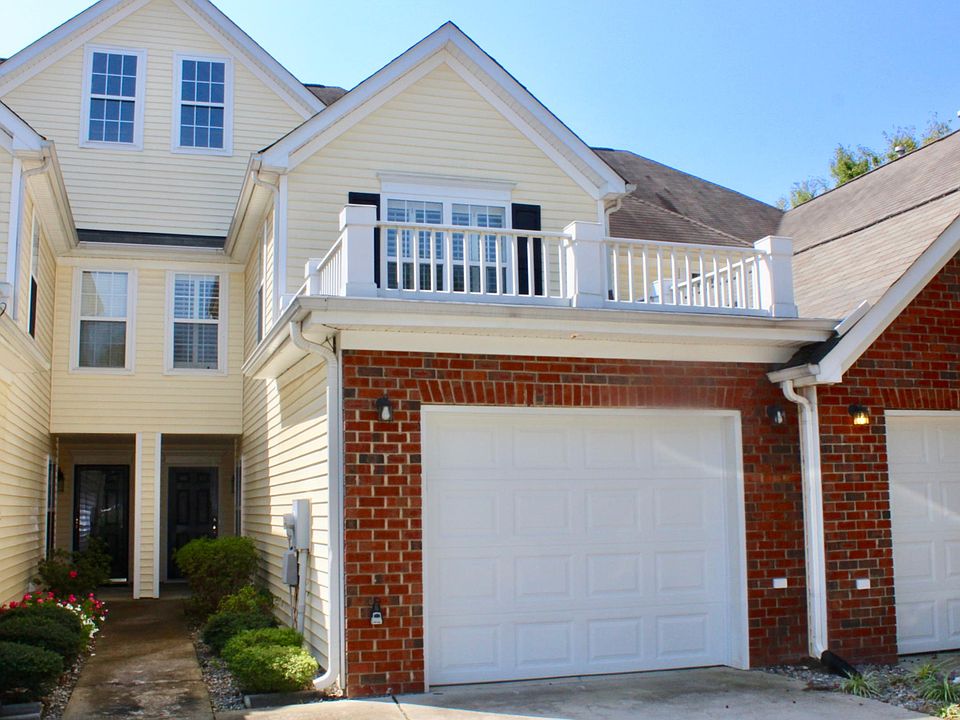 Front of Townhome - 1 Car Garage with Driveway