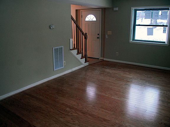 Living room; hardwood floors throughout.