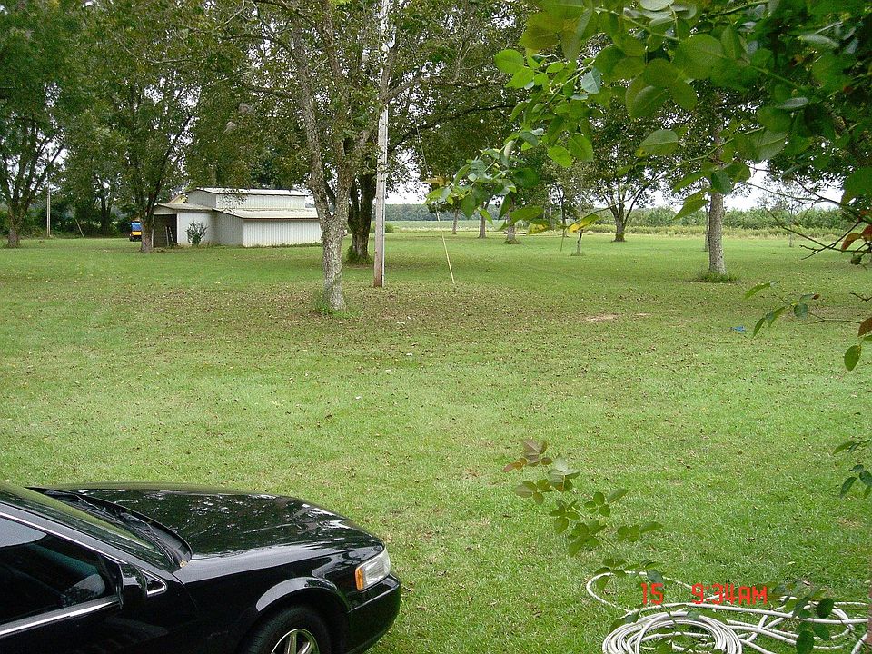 Looking at barn and guest home
