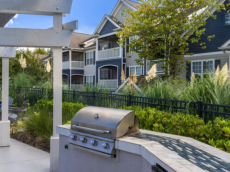 Unleash your grilling skills at our poolside outdoor kitchen, where BBQ dreams come to life in a flavorful paradise.