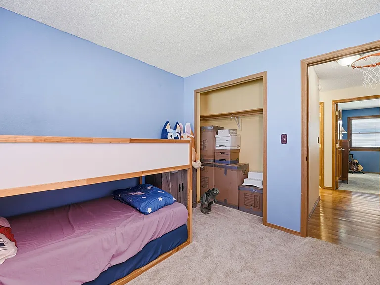 Upstairs bedroom (BD 2), closet and hallway.