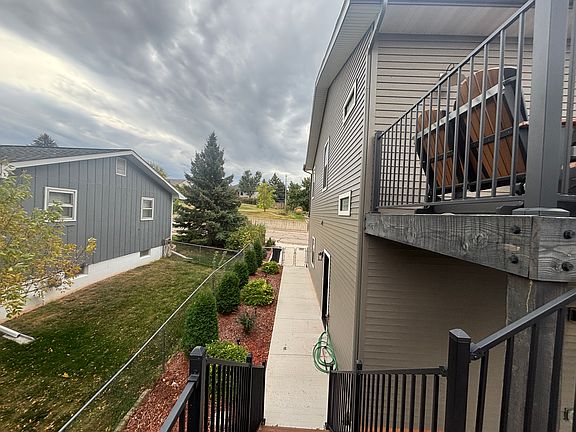 sidewalk to entry, backyard, and deck