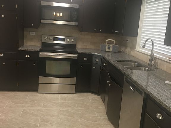 New granite, tile, appliance