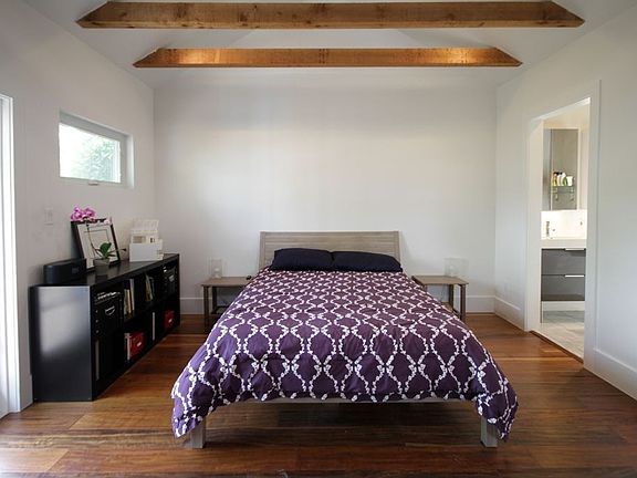 Brazilian teak hardwood floors throughout Master bedroom.  