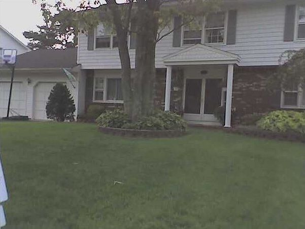 Beautifully landscaped front of home.
