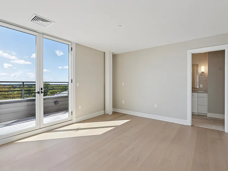 Primary Bedroom with private balcony