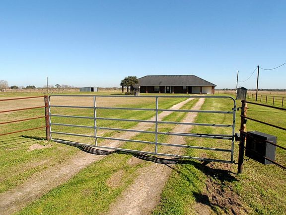 You are greeted by your solar-powered gate with remote control activation.