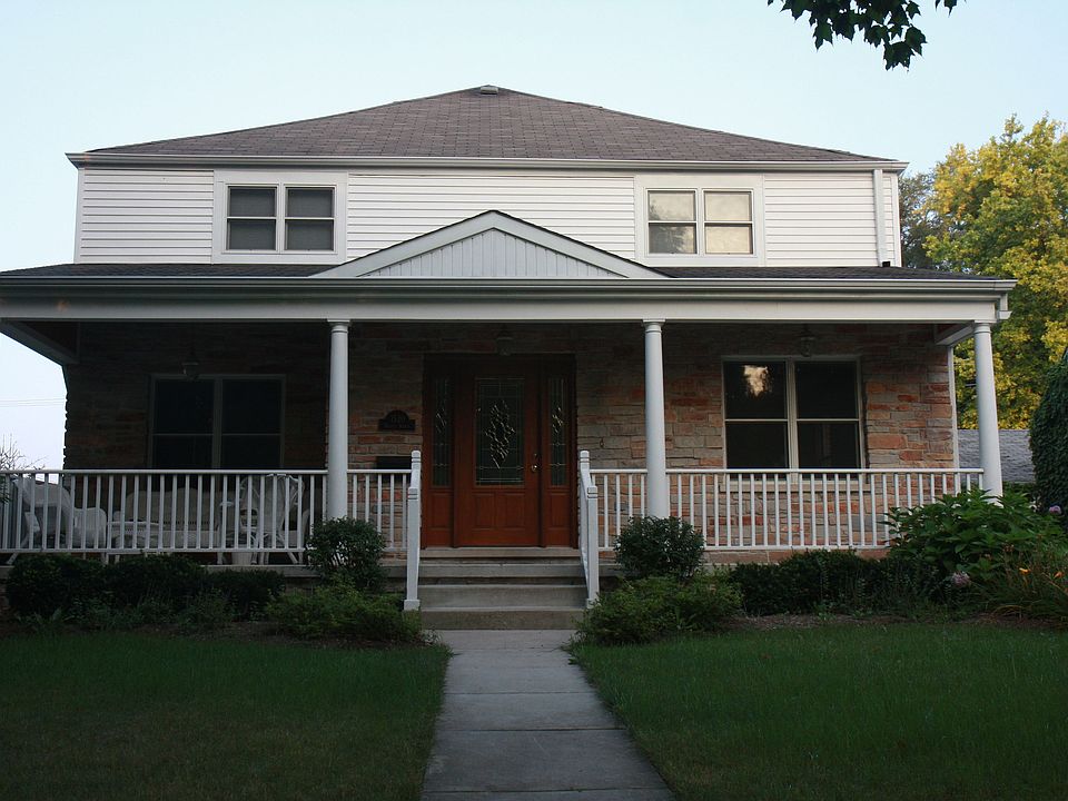 Sit on the porch and watch the kids play at Brickton Park