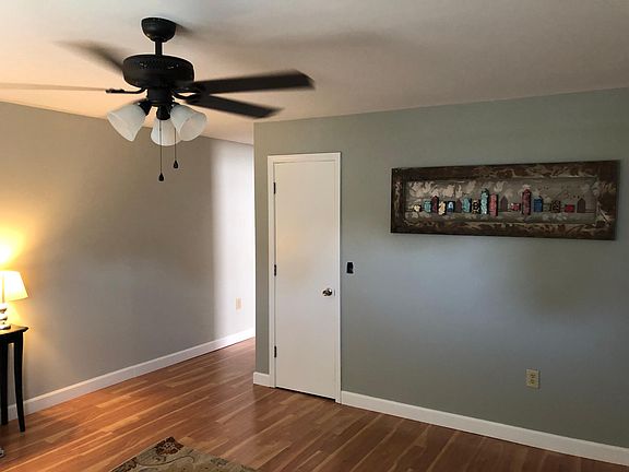 Photo #2 of living room. Hall leads to bedroom, kitchen and bath