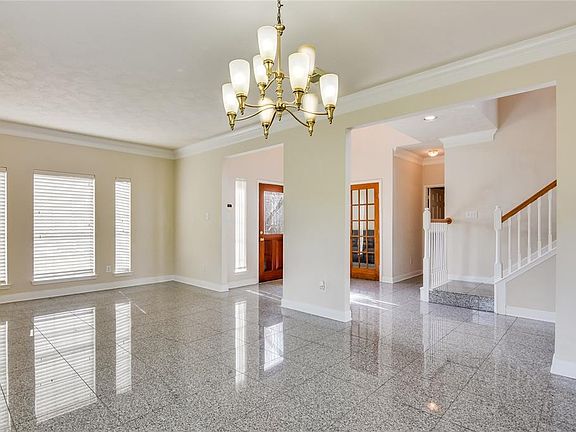 Huge room is a formal dining and living room. Or use it as you want.
