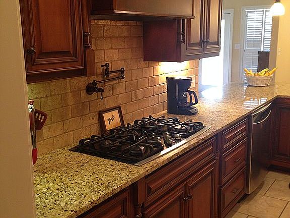 gas range with pot filler