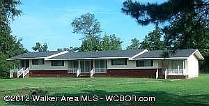 4-unit ranch style apartment building.