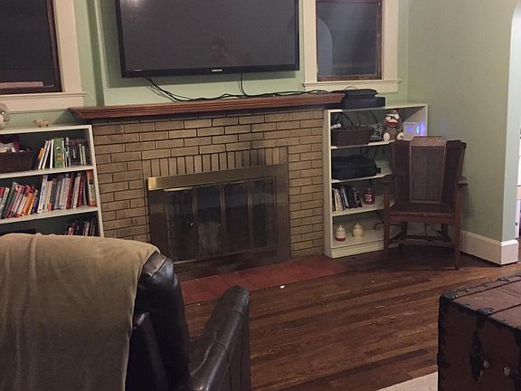 Living Room. Bookshelves are built in.