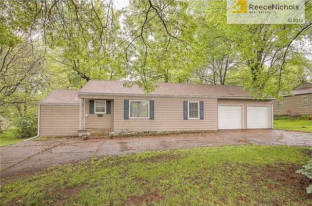 Spacious ranch on treed lot with attached 2 car garage