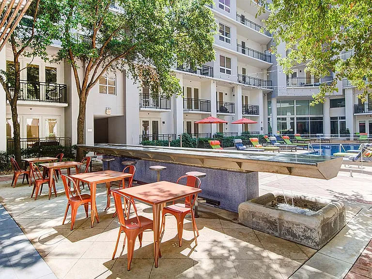 Griffis Uptown outdoor space with water feature.
