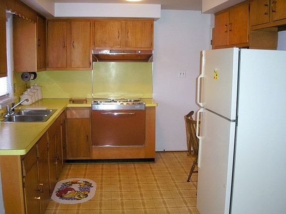 Kitchen with wood cabinets