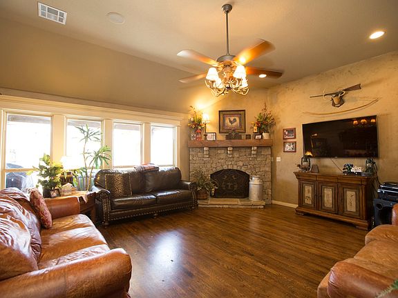 Corner fireplace and wall of windows