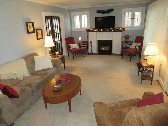 Gas fireplace adds to the comfort of this large living room.