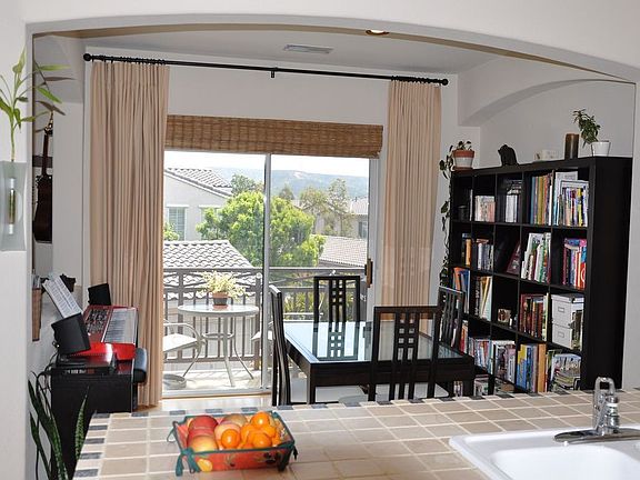 Dining room 10x9 with balcony, view from kitchen, maple hardwood floor 6' plan