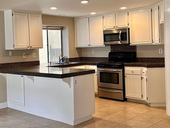 granite counters and stainless steel appliances