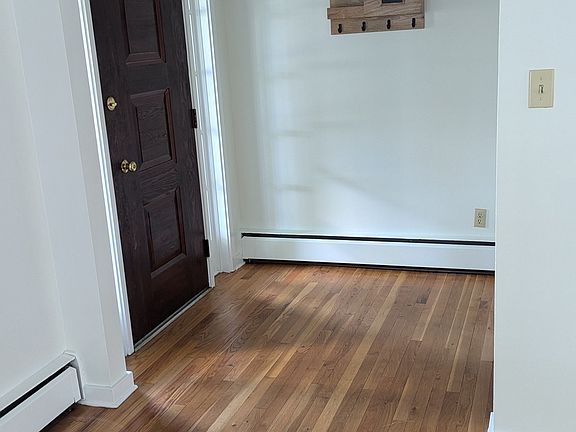 front rntrance....beautiful refinished hardwood floors throughout