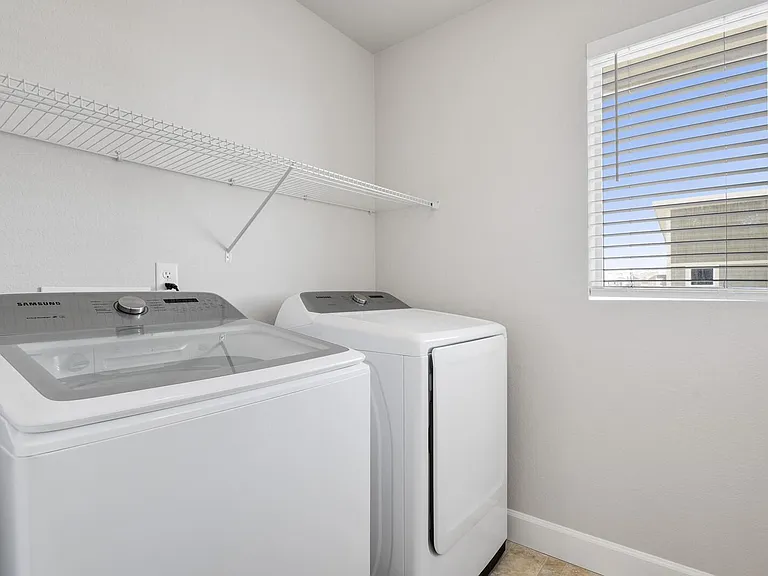 Separate laundry room on upper level
