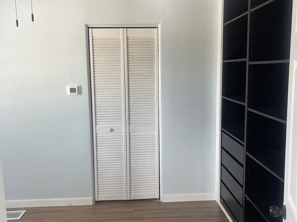 Bedroom with wall unit