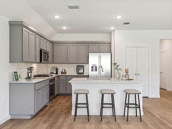 Kitchen with all stainless steel appliances