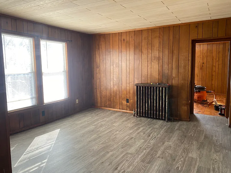 Living space looking into bedroom