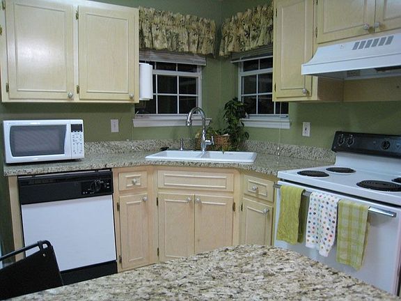 granite counters & cast iron sink