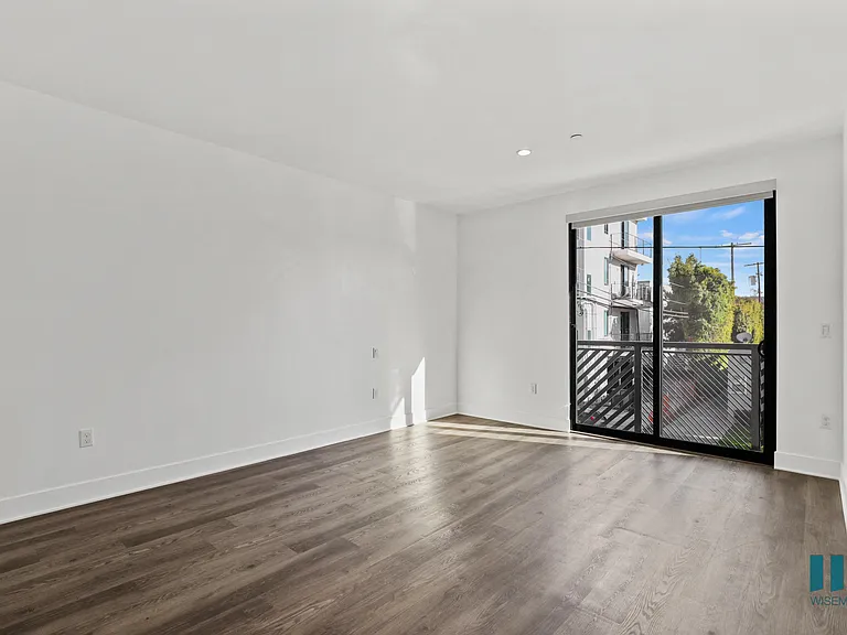 Living Room with Recessed Lighting, Vinyl Flooring, and Balcony