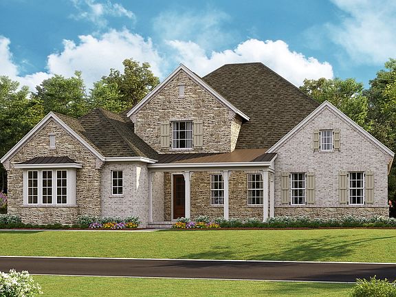 Brentwood - European Cottage d 3-Car Side Load Garage Note Renderings may show optional featu