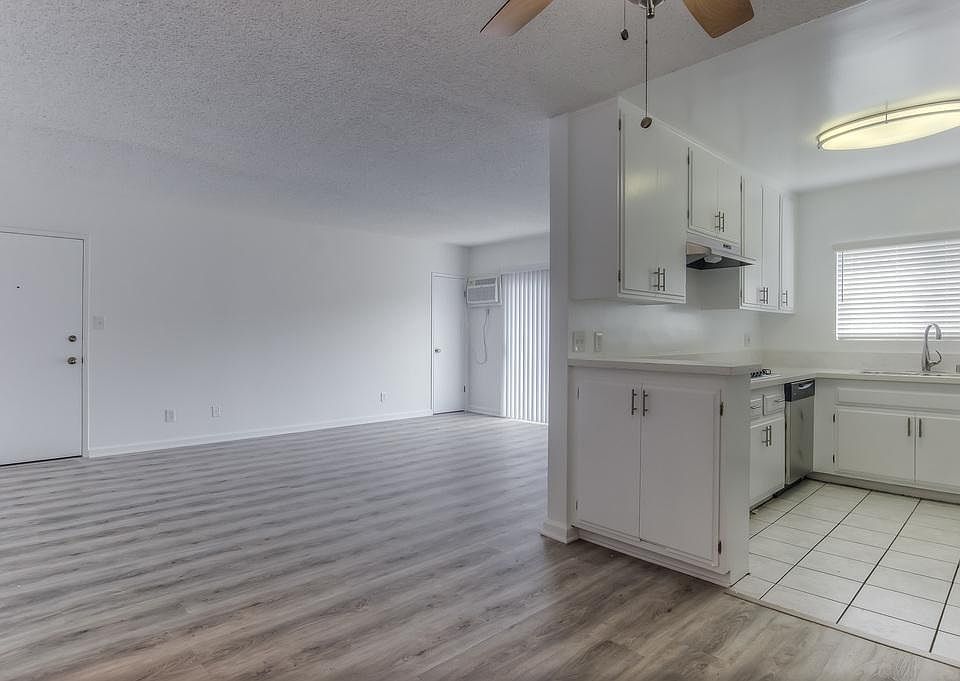 Natural lighting, wood floors and plenty of cabinet space.
