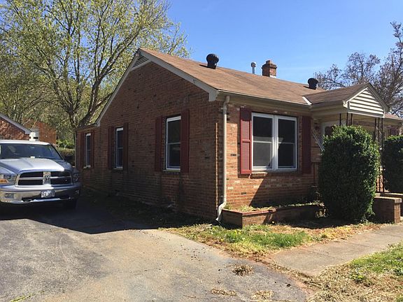 Driveway and left side of home