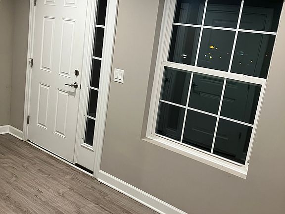 As you step through the front door, you're greeted by a bright and inviting entryway that sets the tone for the rest of the home. The open layout creates a sense of space, while the elegant design adds a touch of charm and warmth.