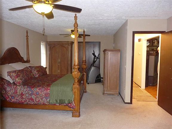 Master bedroom - notice two ceiling fans!