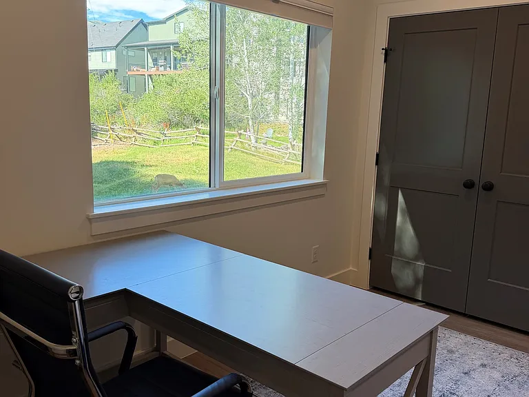 Main level bedroom that doubles as an office