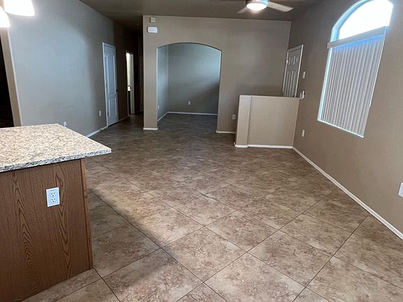 Living Room, Entry & Den - 20" diagonal ceramic tiles